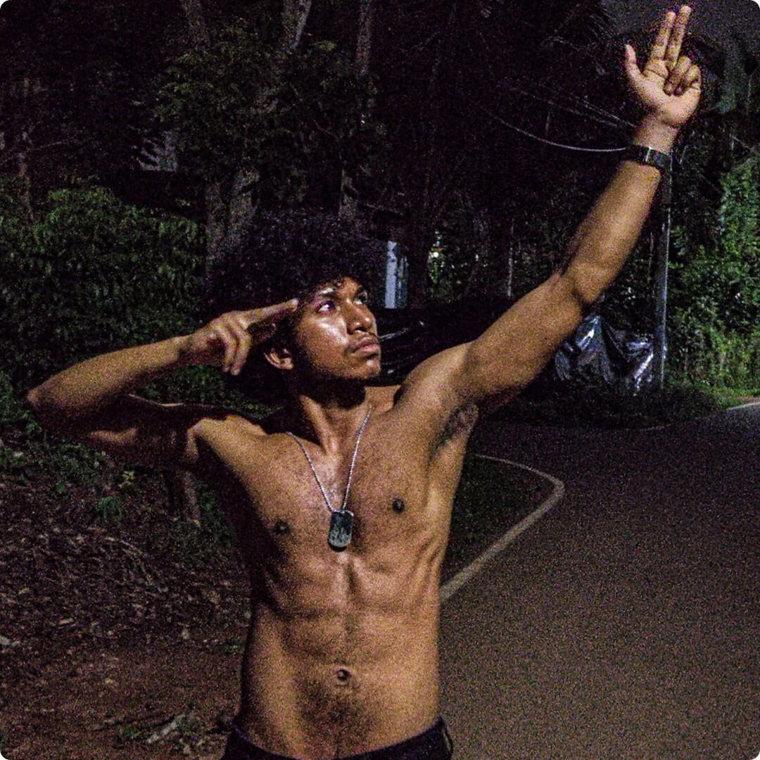 TechTheBoy Gym Pose shredded bodybuilder posing pointing at the moon in the night sky standig on the road Mobile